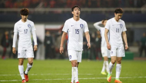 中韩足球靠尺子量吗：是实力较量还是另有隐情？